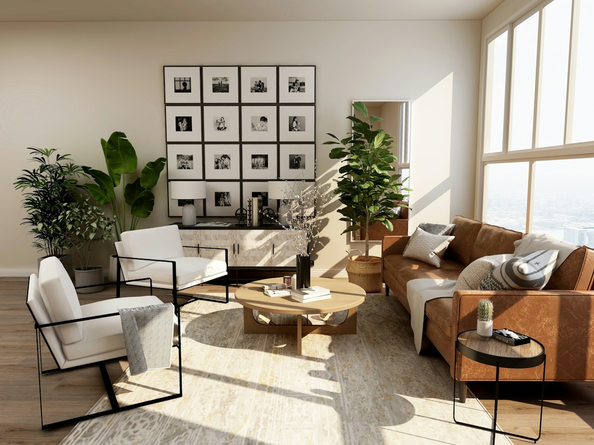 Light-filled living space with a tan sofa and natural timber furniture
