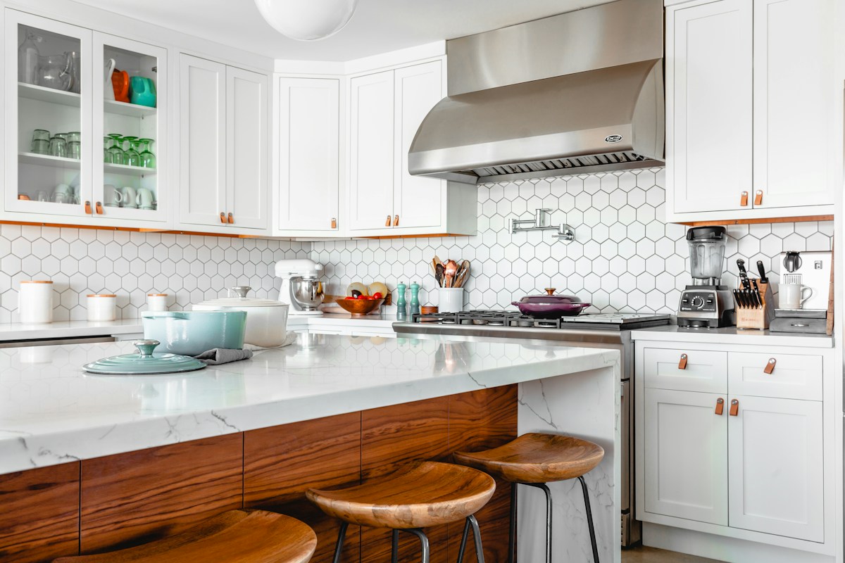 Bright kitchen with white surfaces and natural light